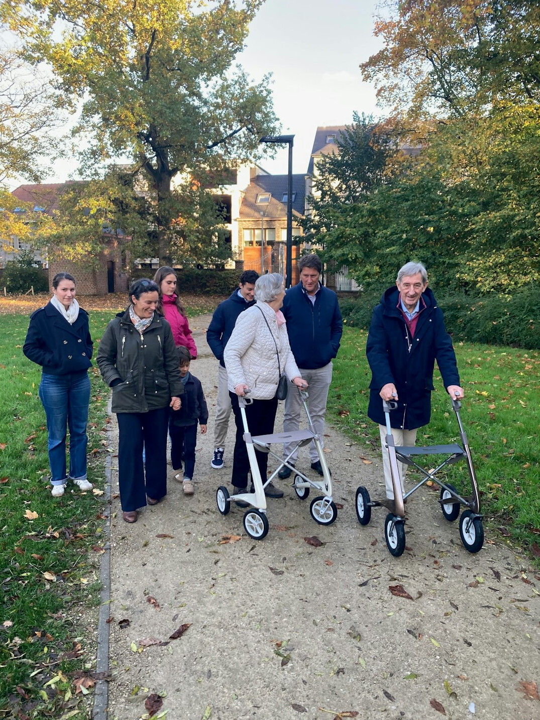 elderly people walking in park