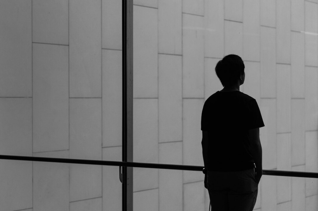 person alone thinking