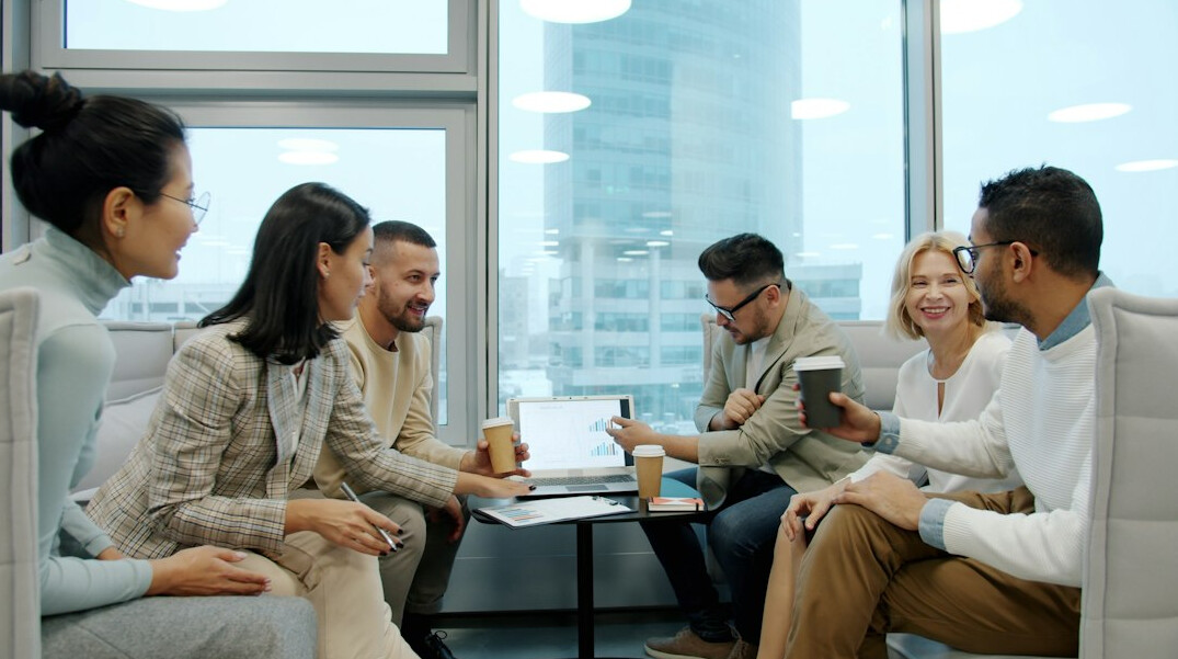 diverse people discussing in group